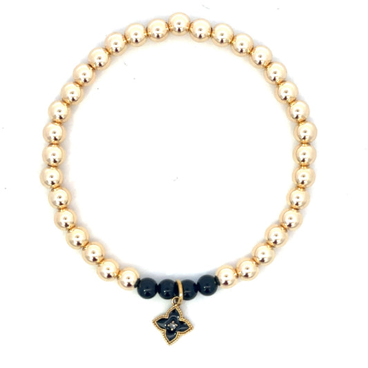 Gold Filled Bead Bracelet with Black Bead Accents and Enamel Moroccan Cross