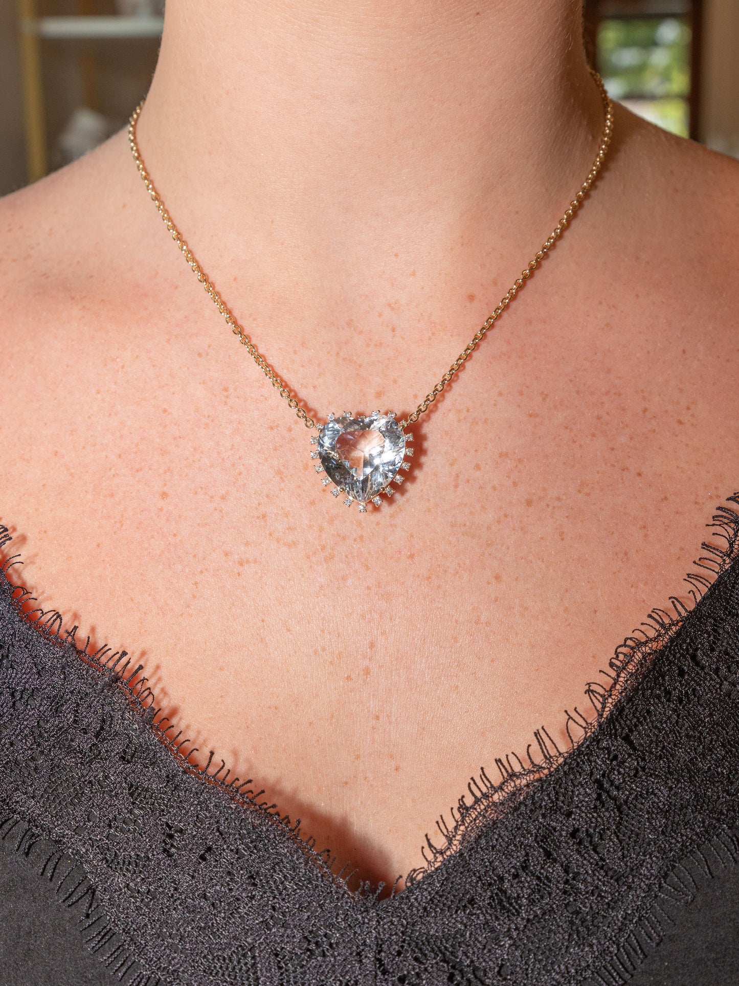 Yellow Gold White Topaz Heart Necklace with Prong Set Diamonds