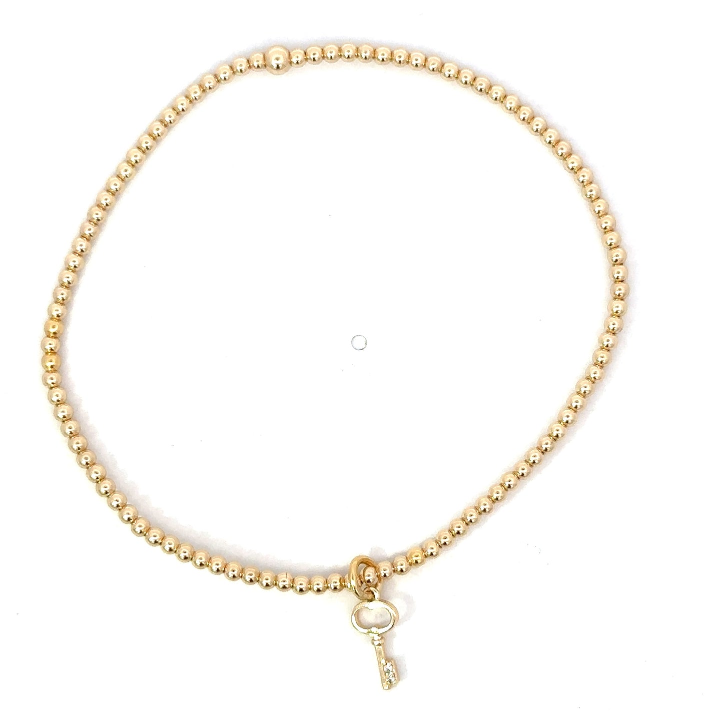 Gold Filled Bead Bracelet with Tiny Key Charm