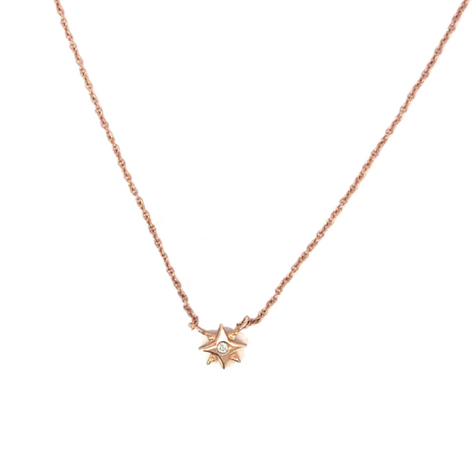 Tiny 8 Point Star Necklace with Diamond Center