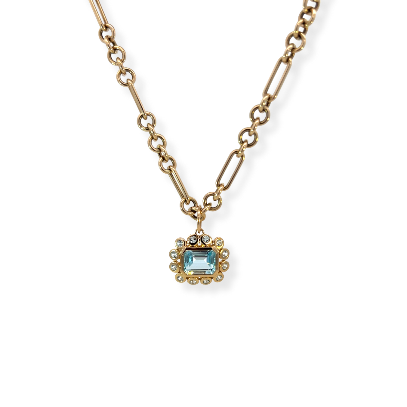 East West Emerald Cut Blue Topaz Pendant with Bezeled Blue Topaz Halo