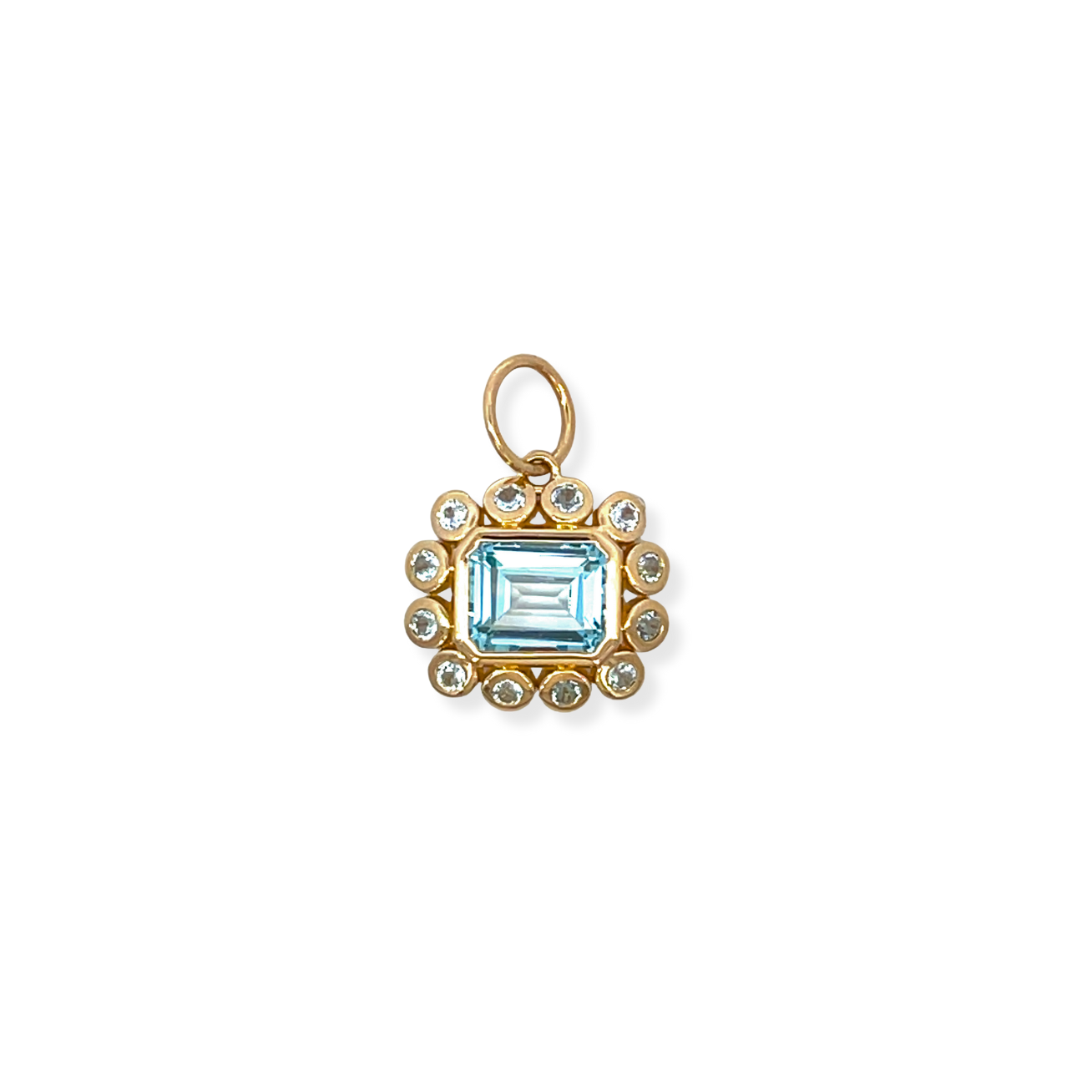 East West Emerald Cut Blue Topaz Pendant with Bezeled Blue Topaz Halo
