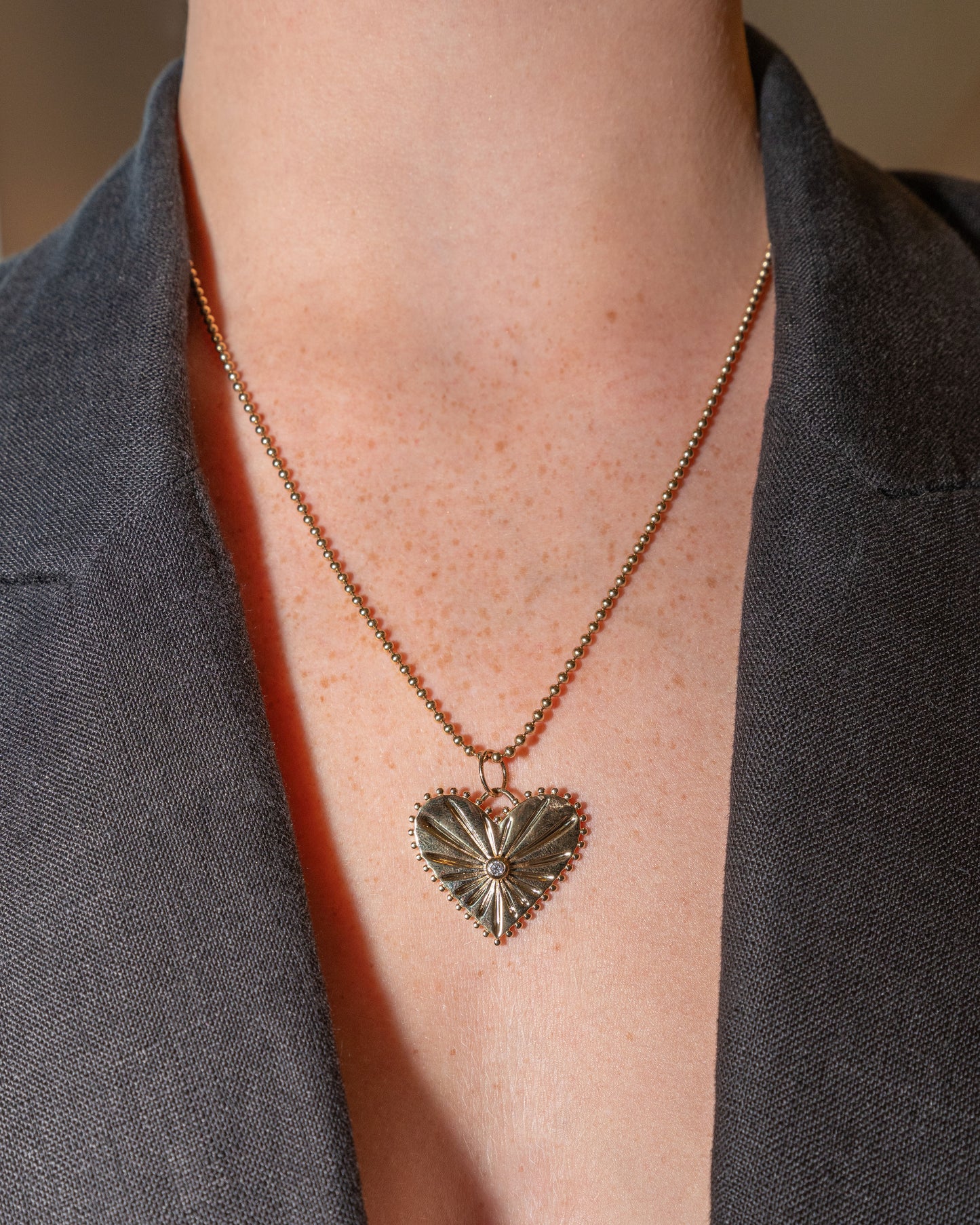 Large Yellow Gold Heart Pendant with Single Bezeled Diamond