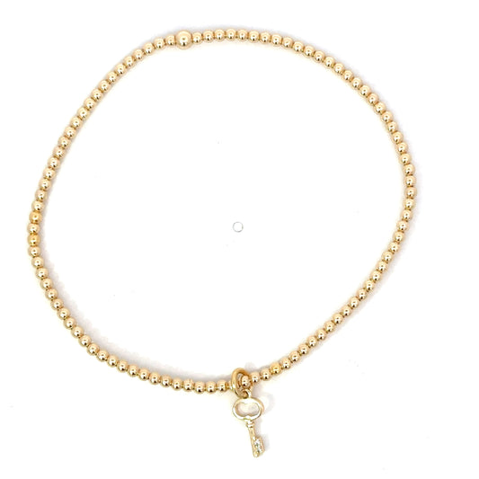 2mm GF Bead Bracelet with Tiny Key Charm